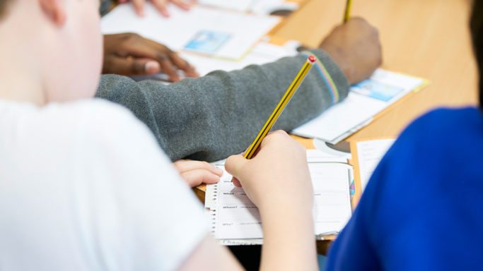 Students writing in English session