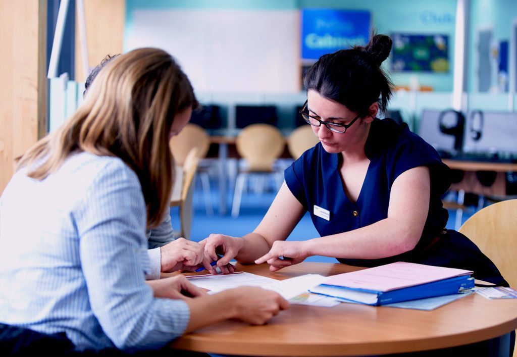 Parents' evening: parents and teacher