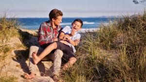 Father and son on the beach