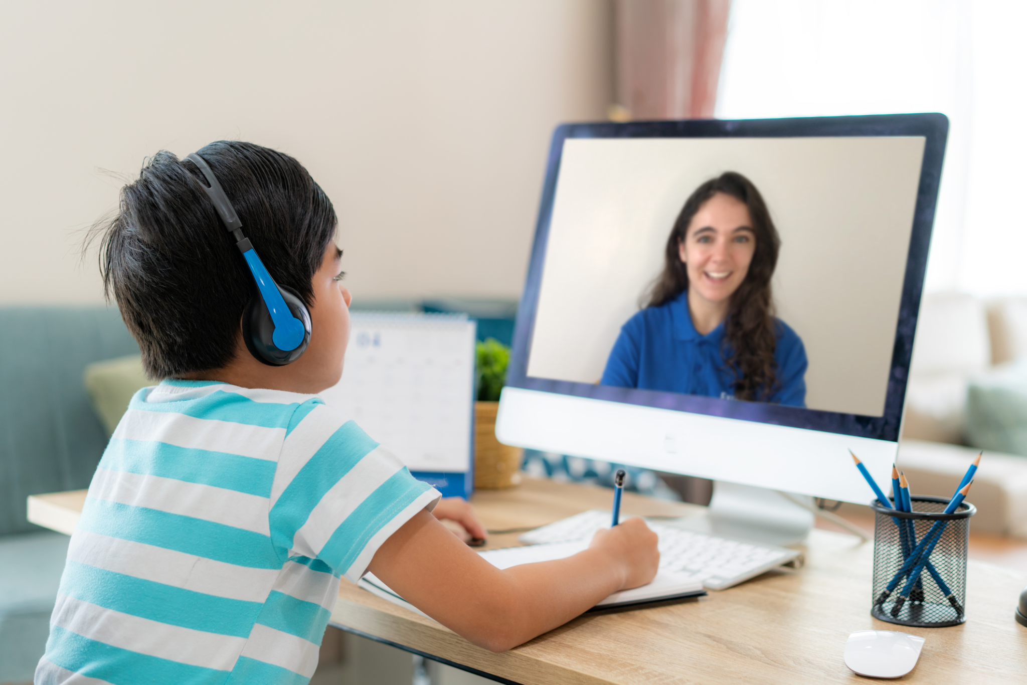 Child with online tutor