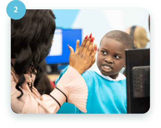 Tutor high fiving student